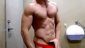 Hung bodybuilder flexing shirtless in all directions in flames weasel words sox boxer shorts zak rogerz
